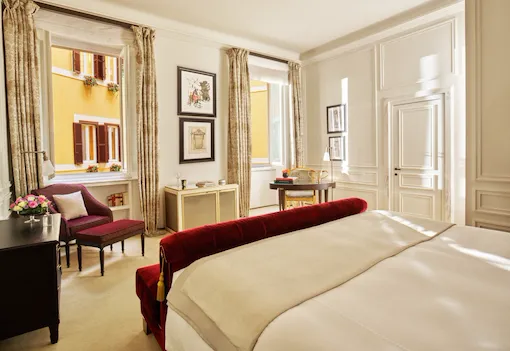 junior suite bedroom with internal view at Hotel Eden