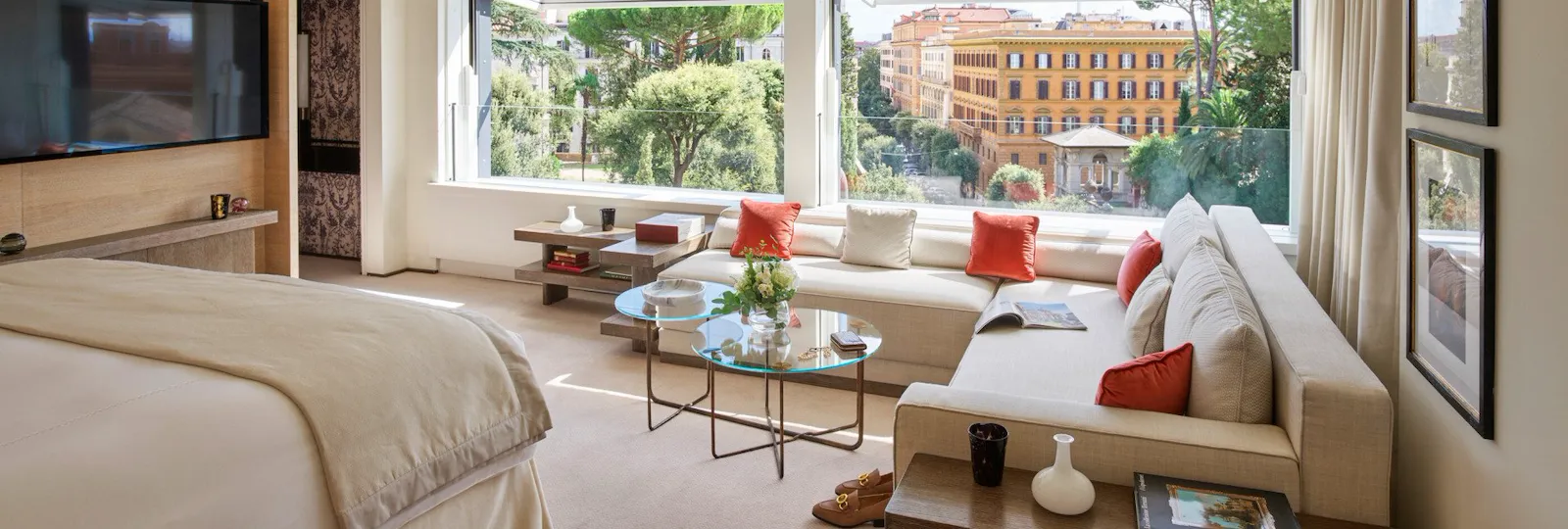 Bellavista Penthouse Suite bedroom with windows open to view of Rome, Hotel Eden