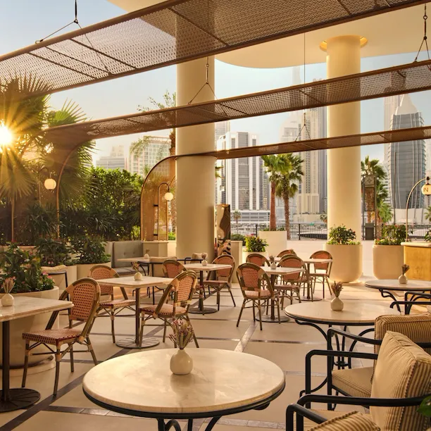 Pictures depict Bonbon Café Angelo Musa indoor and outdoor areas.
