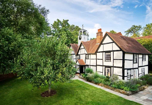 Facade of Dower House in summer at Coworth Park, Ascot