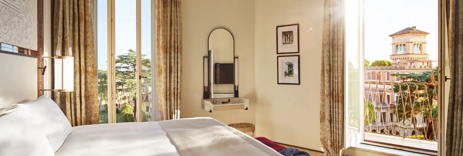 Bedroom of Villa Medici Presidential Suite with view of Villa Malta at Hotel Eden, Rome
