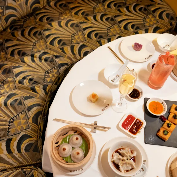 Birds eye view of table with dumplings and cantonese food at China Tang.