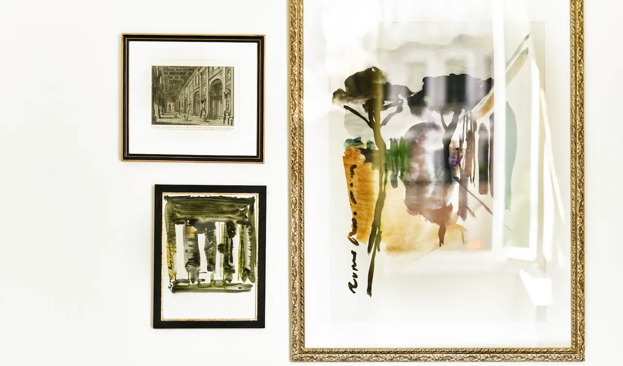 Three paintings and illustrations inside Junior Suite at Hotel Eden, Rome