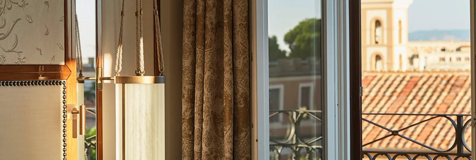 open window overlooking Rome view with lamp detail on the side