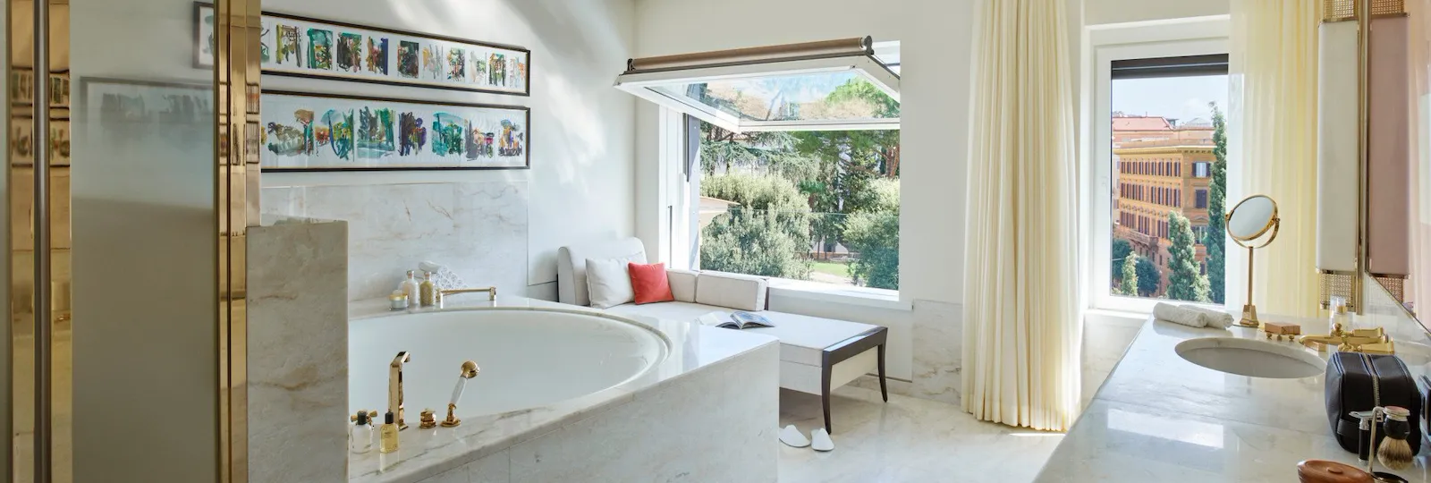 Bathroom with large bathtub inside Bellavista Penthouse Suite at Hotel Eden, Rome