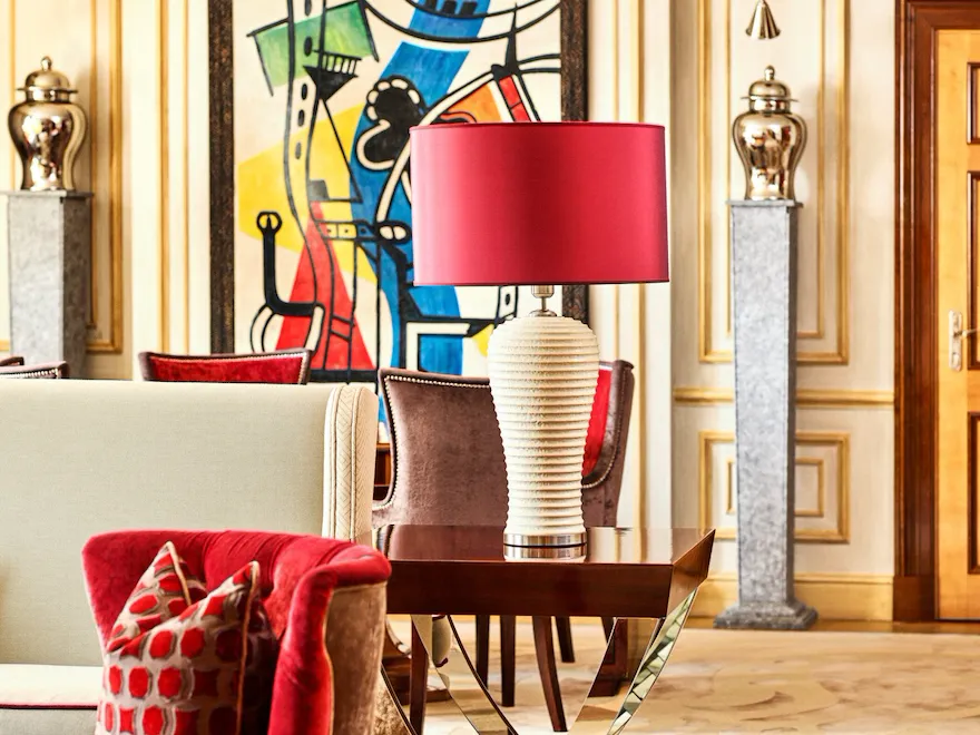 Pink armchair and lamp in Imperial Executive Suite at Hotel Principe Di Savoia, Milan