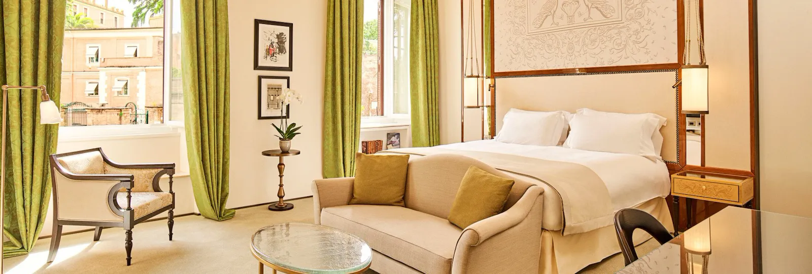 Elegant Junior suite bedroom with green curtains at Hotel Eden, Rome