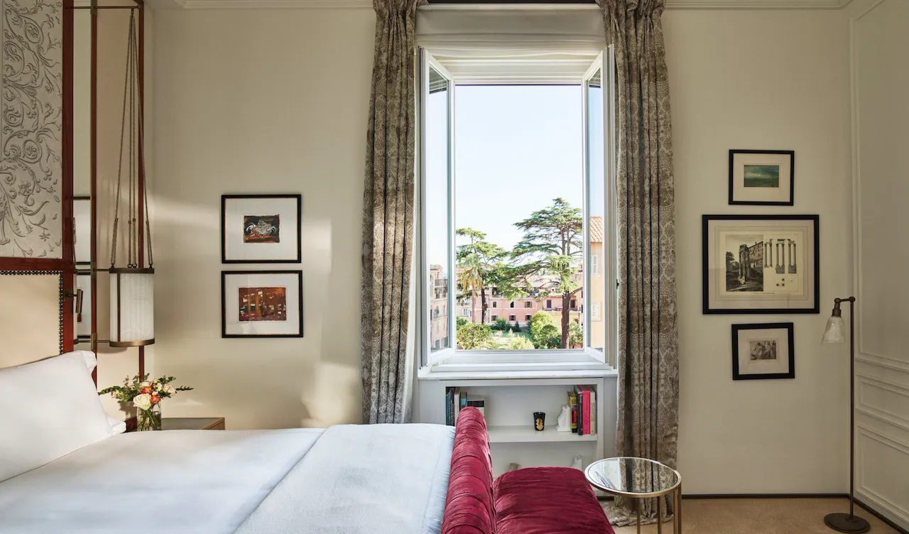 Dolce Vita Suite bedroom with view of Rome at Hotel Eden