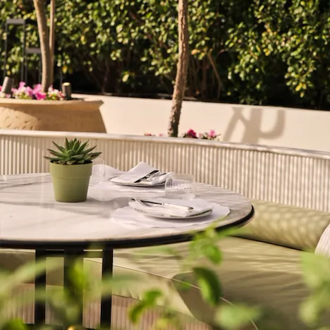 Image of Veranda design and food at The Lana - Dorchester Collection