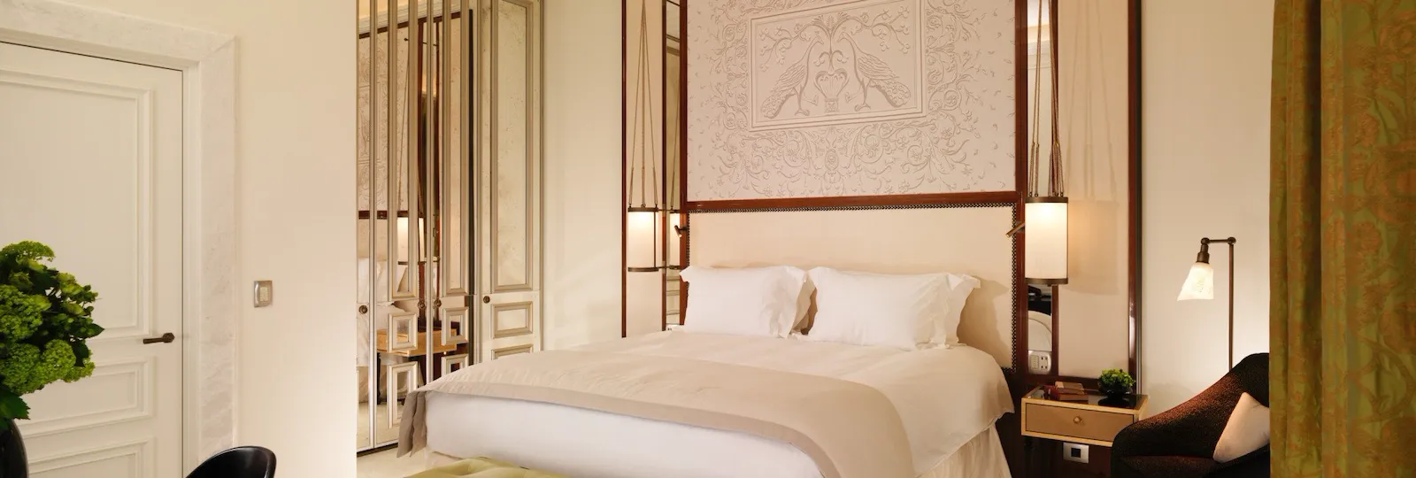 Bedroom of Prestige Room and headboard with peacocks illustration at Hotel Eden, Rome