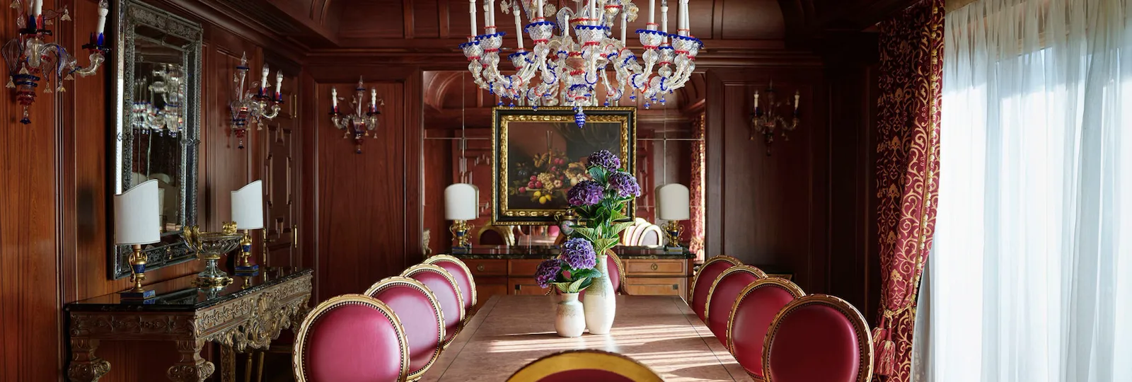Presidential Suite dining room with beautiful and colorful flowers on the table