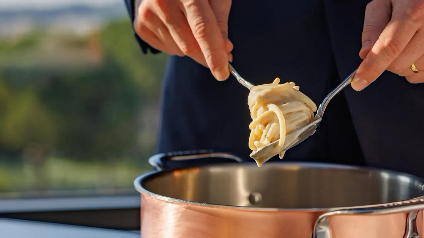 Cacio e pepe served at the table at Il Giardino Ristorante