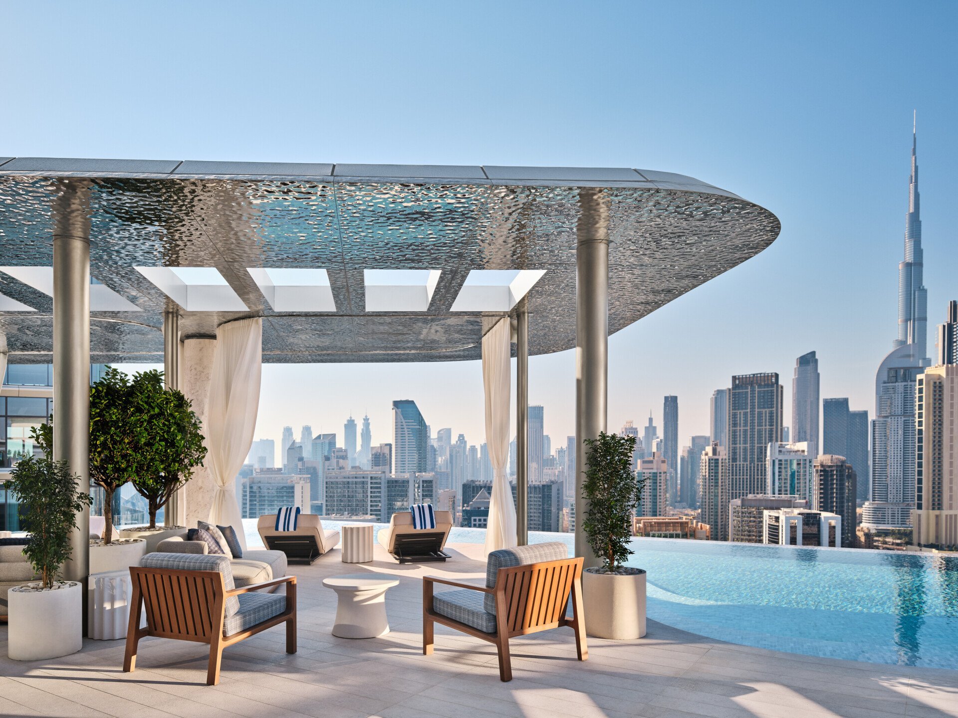 The Lana's poolside lounge with incredible views of the city. Image credit: The Lana/Dorchester Collection