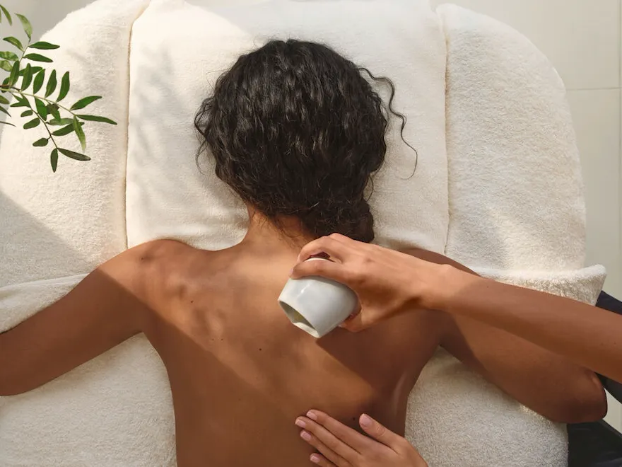 Massage being completed on female model The Spa at Coworth Park