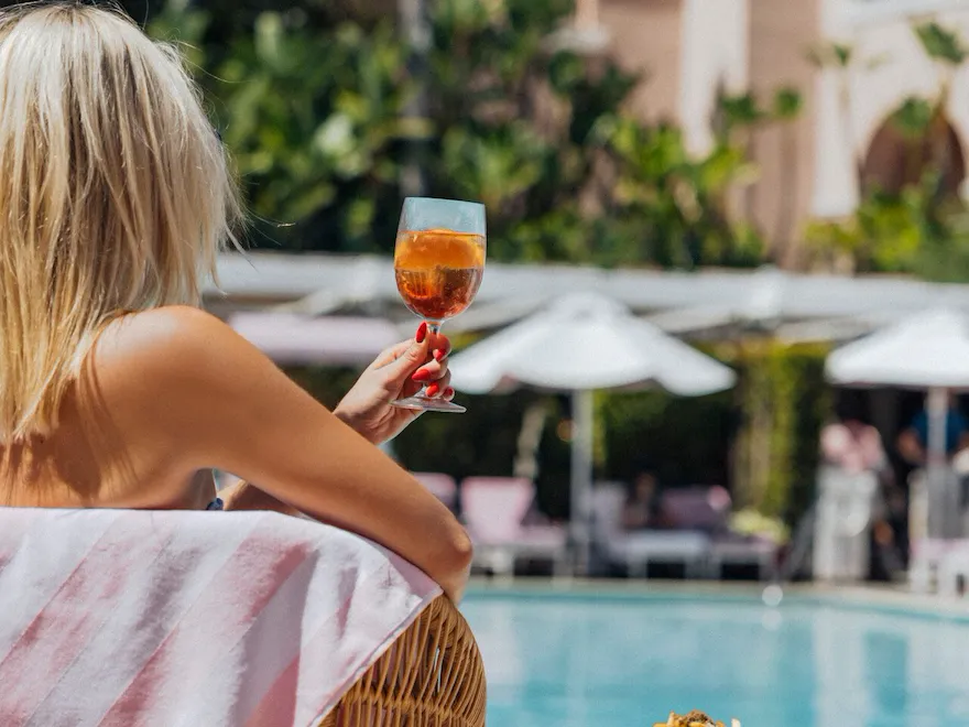 Model enjoying moment at the BHH pool